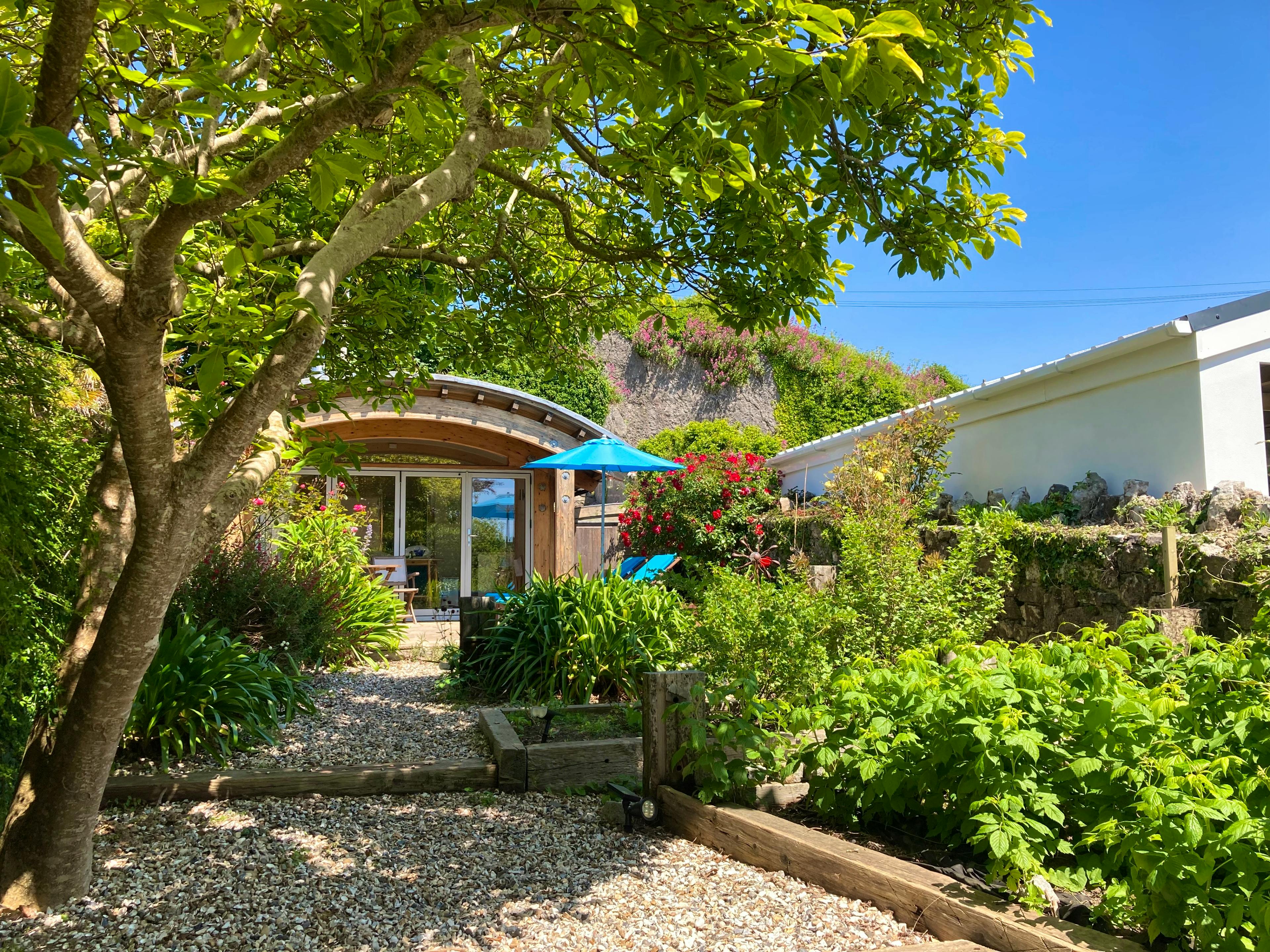  Relax in the south facing garden.