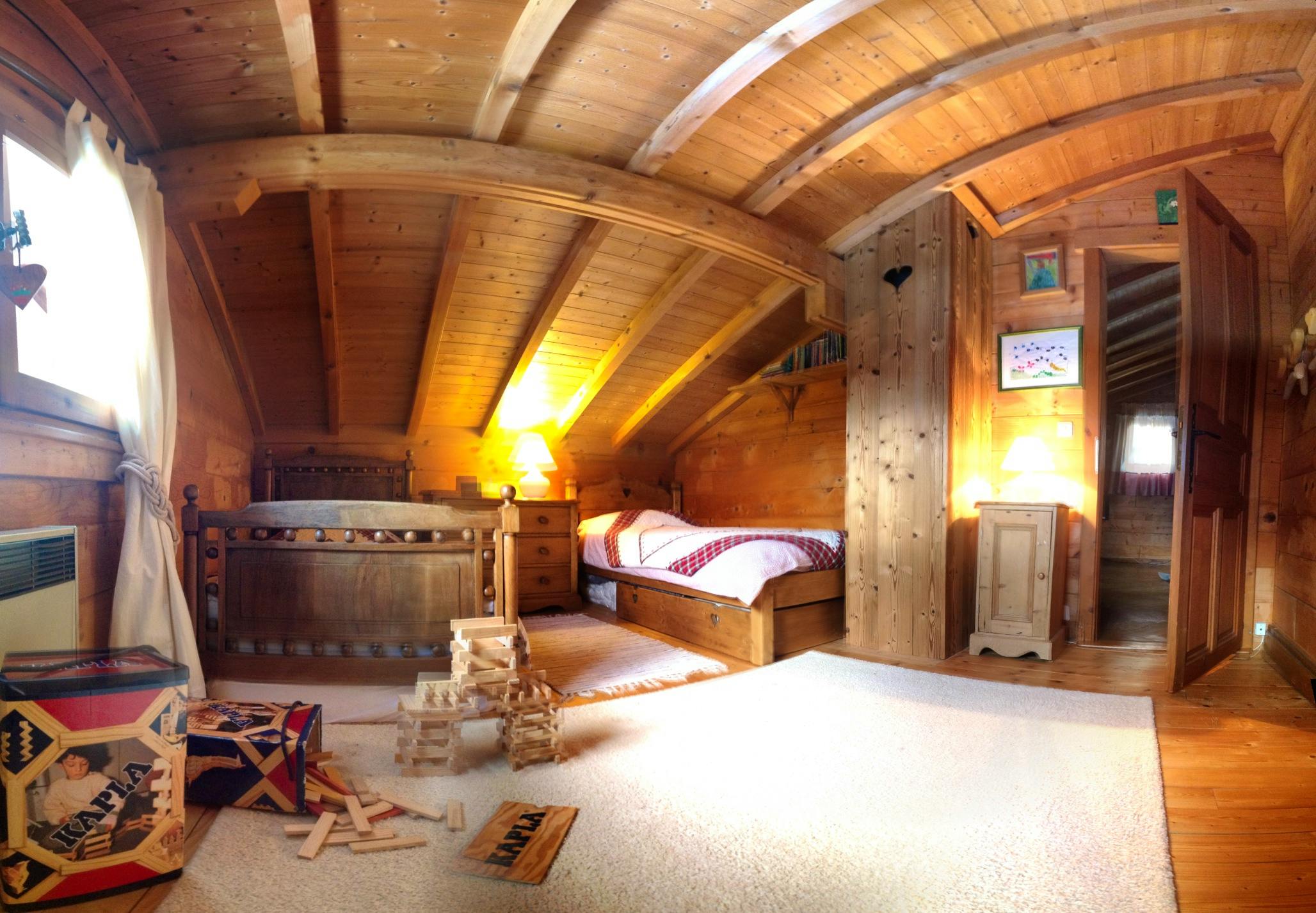 bedroom with two single beds (additional mattresses underneath)