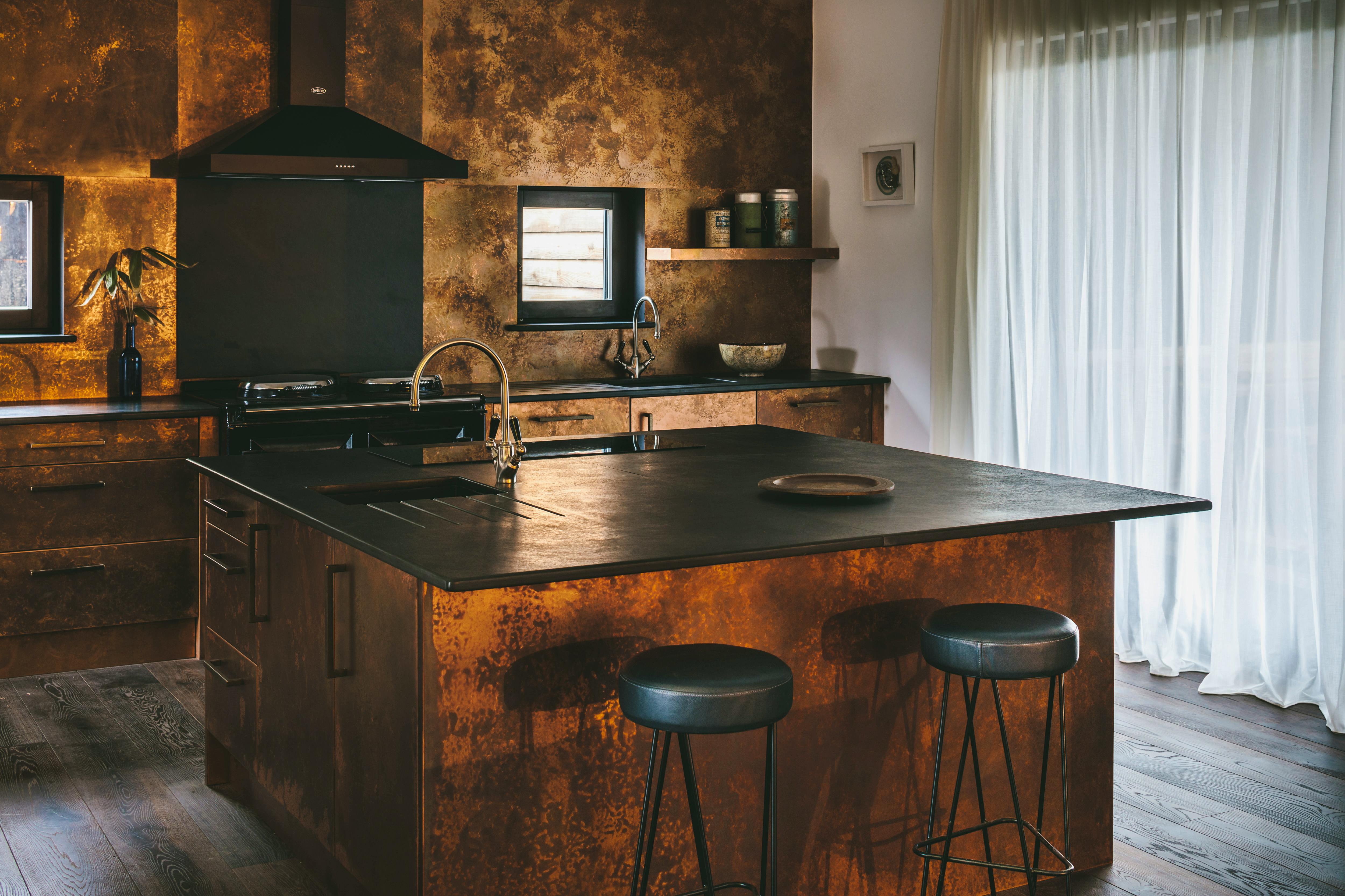 Copper clad Kitchen with dual control Aga and 2 dishwashers