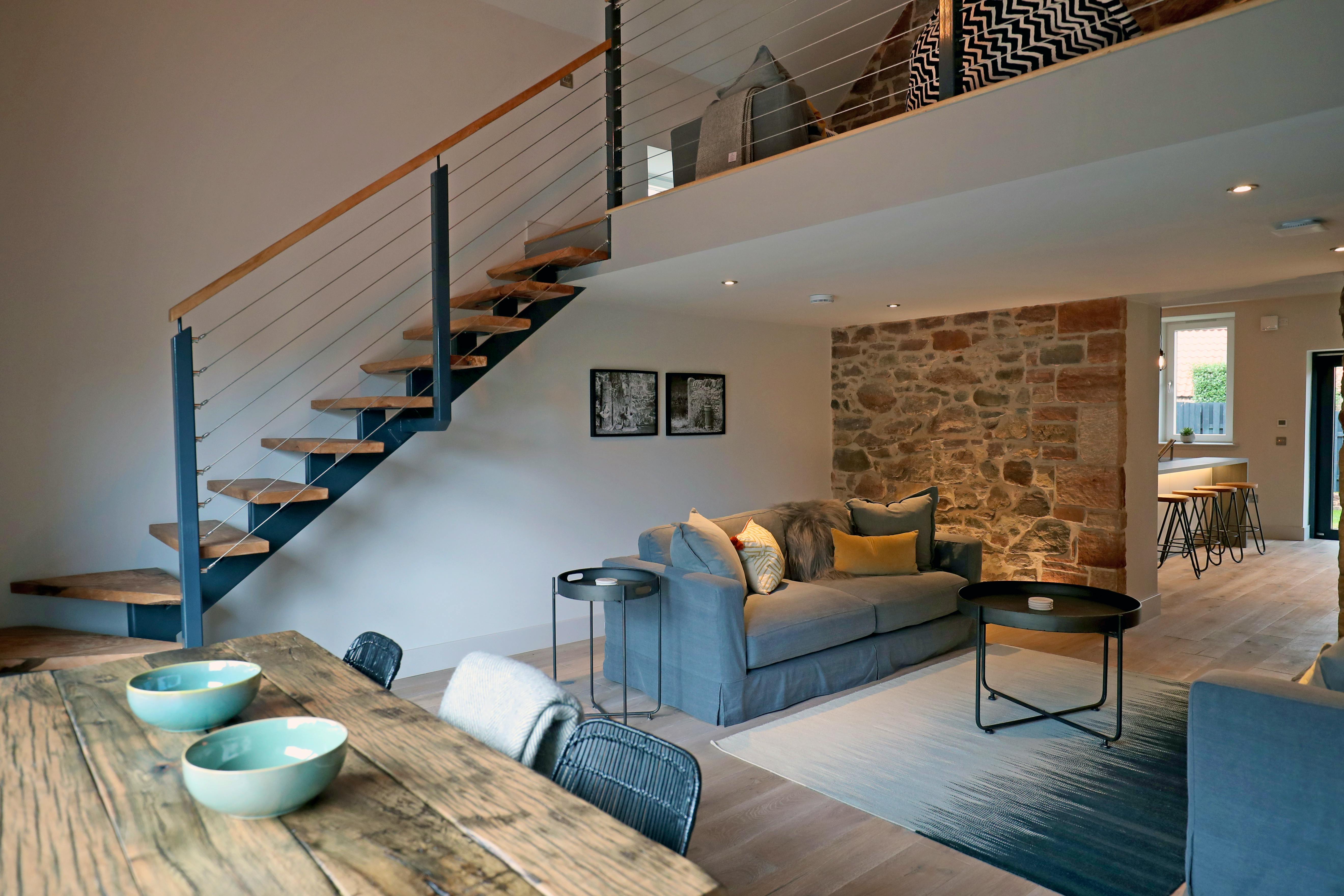 The Barn - Living Room & stairs to mezzanine level