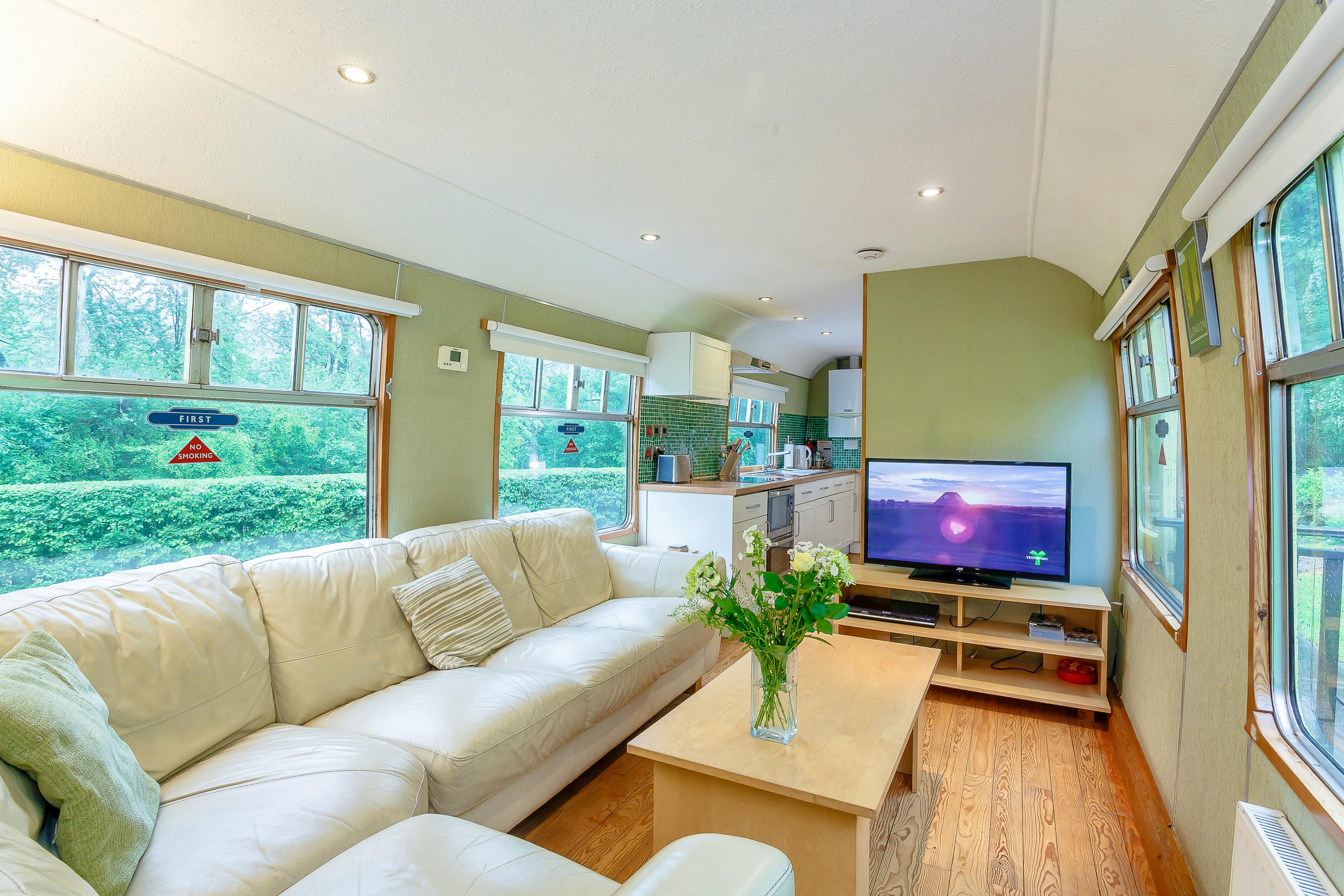 Int. 3b. carriage 2 view of lounge from kitchen dining
