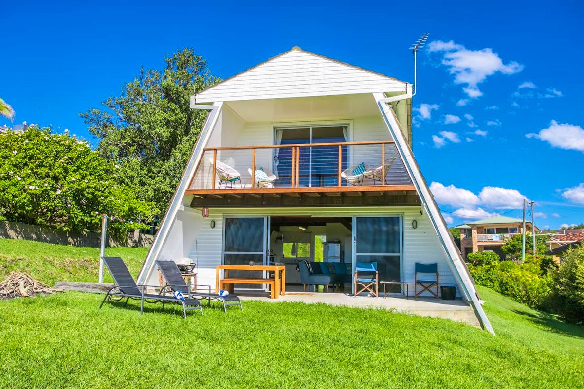Scotts Head A Frame Classic 1970’s beach house with absolute beachfront positioning on top of