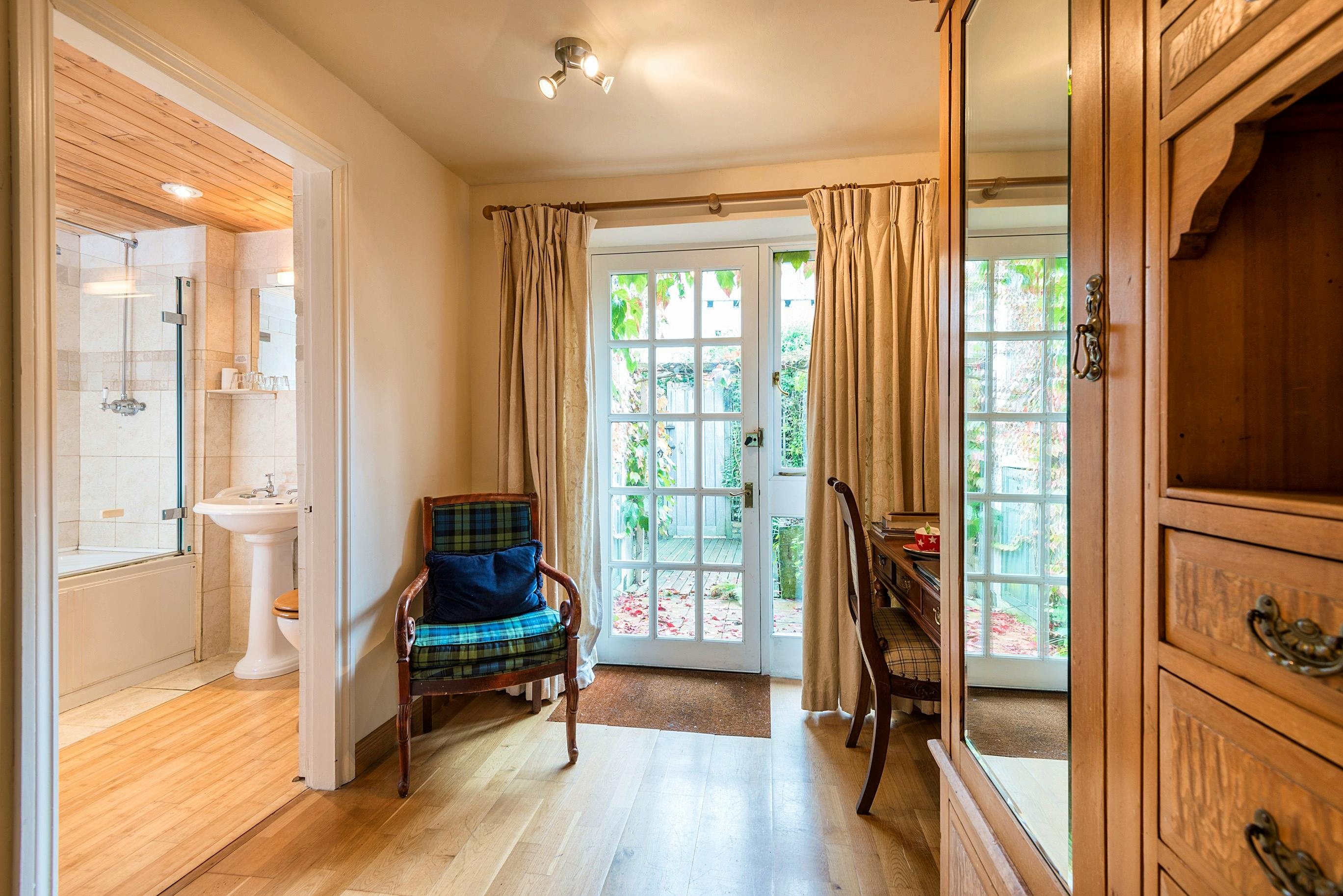 Downstairs door to private patio