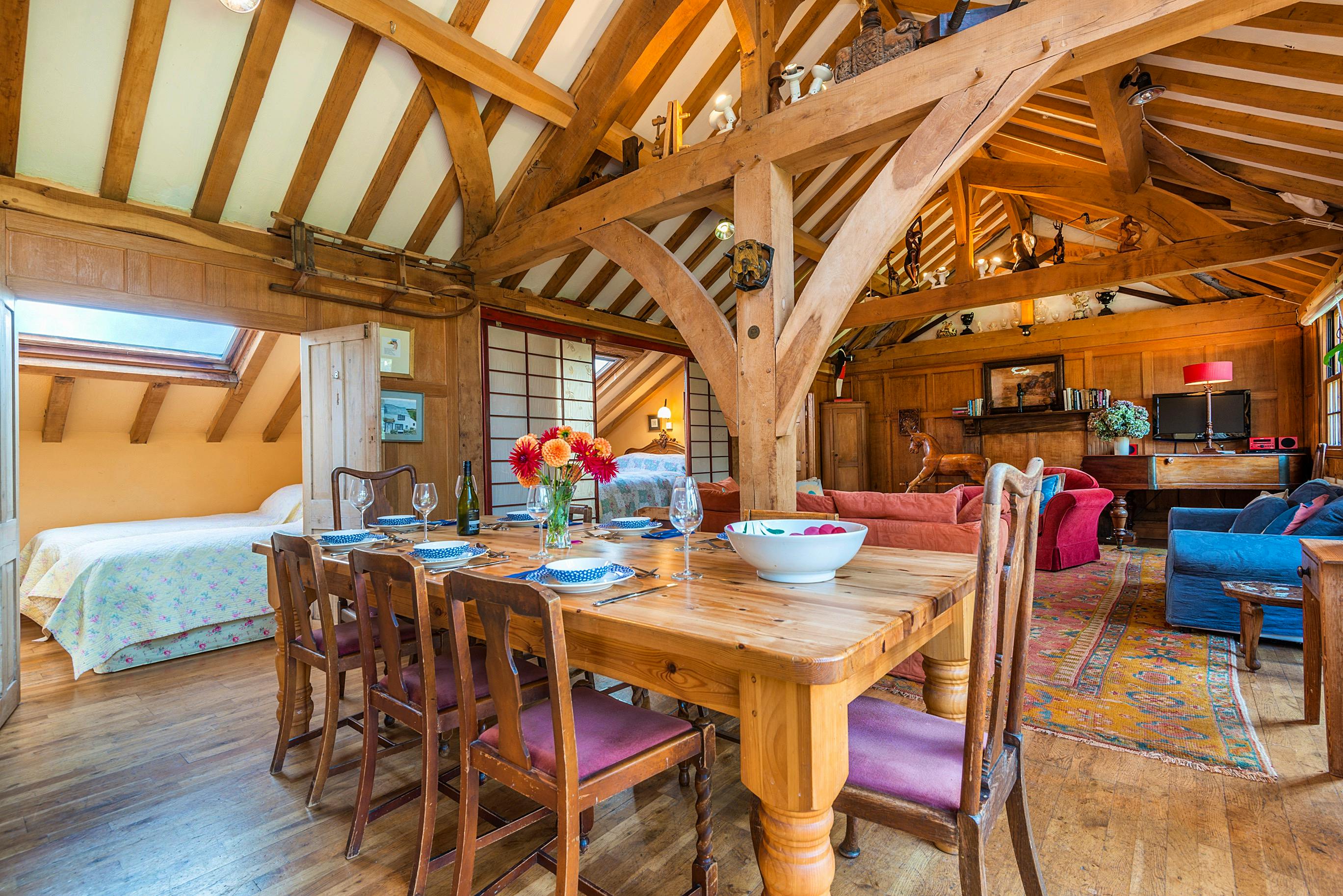 Dining area (with twin sleeping space) and sitting at the far end. 