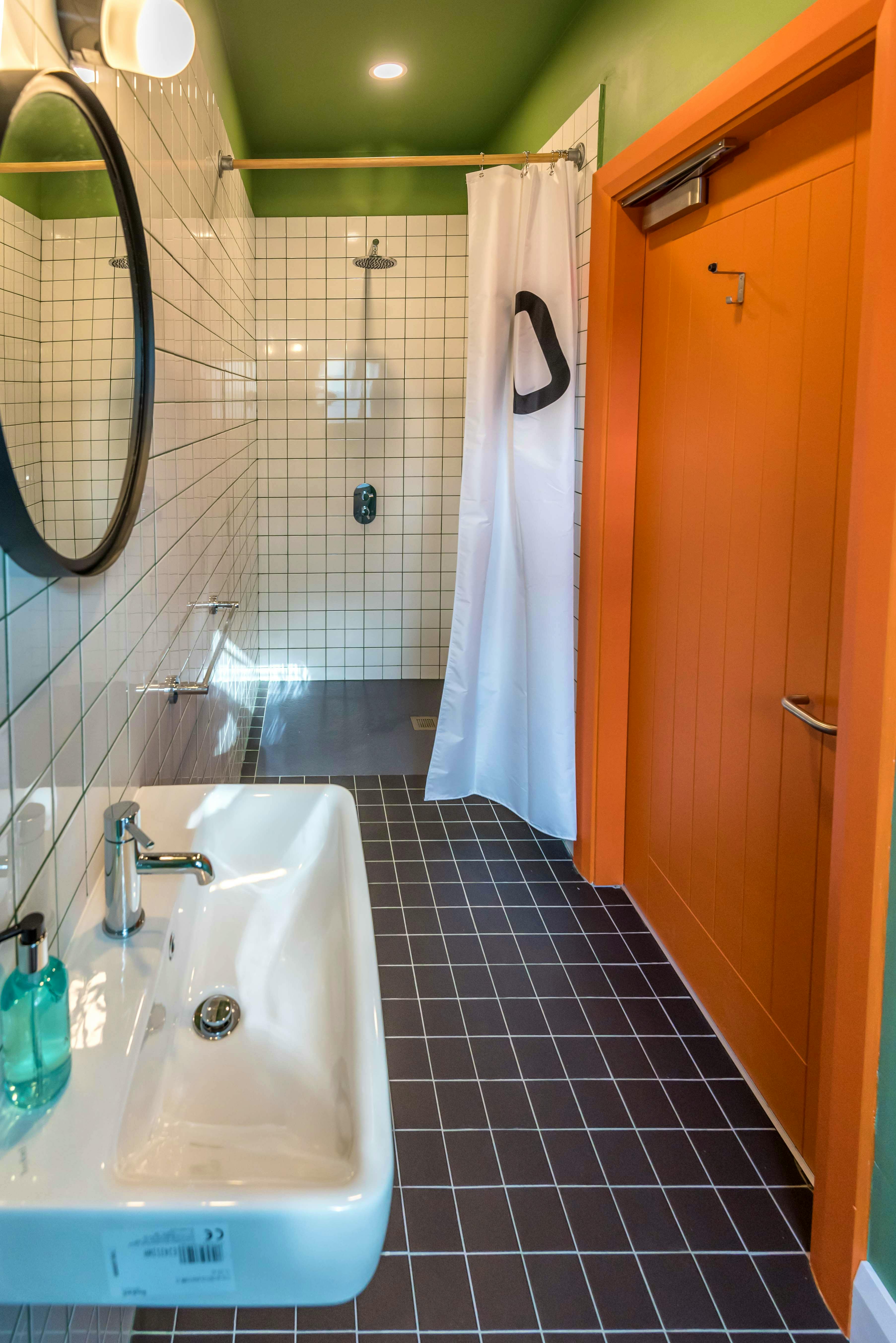 ENSUITE BATHROOM (9 BATHROOMS ARE SHOWER WETROOMS, 1 BATHROOM HAS A BATH)