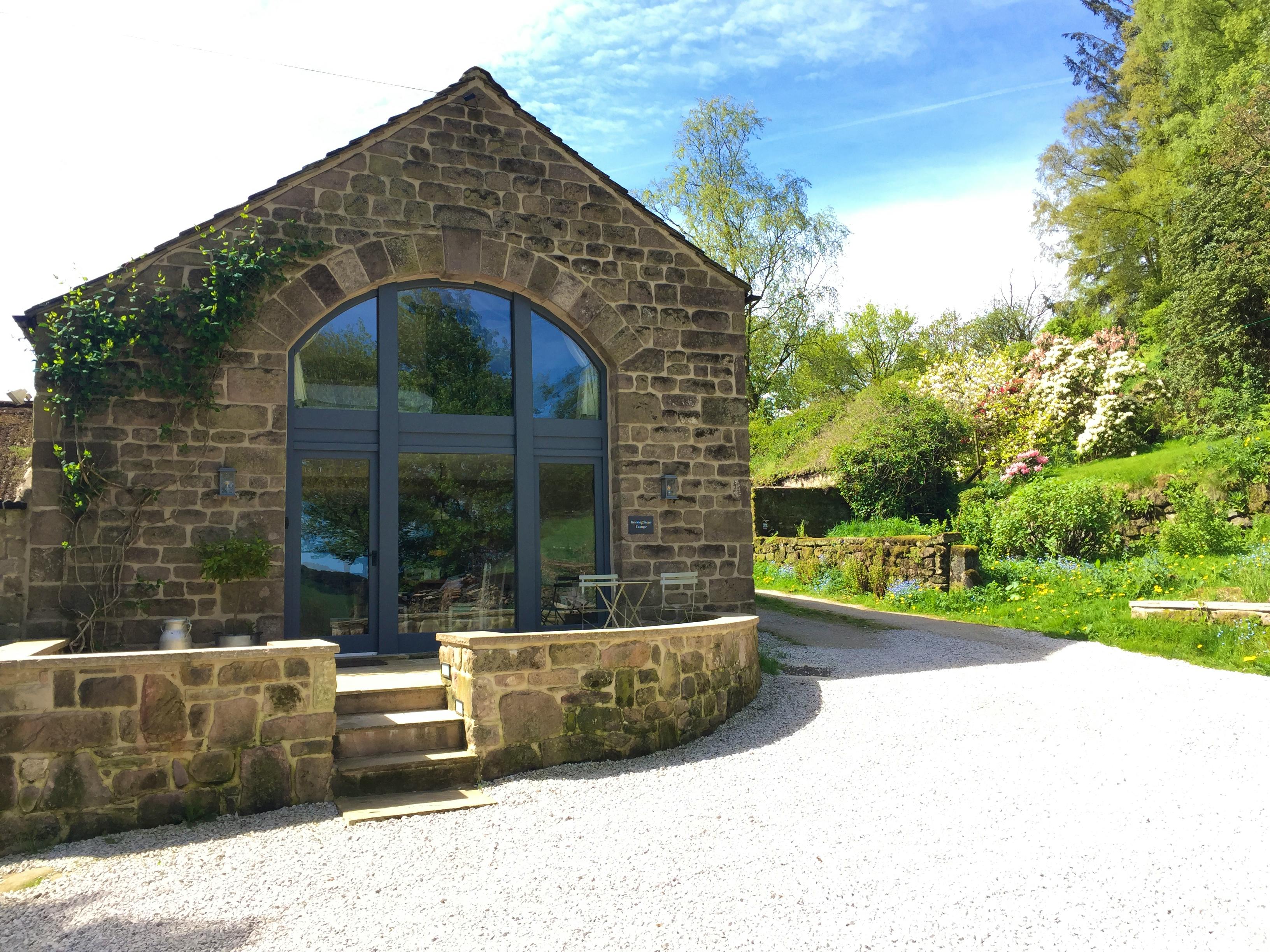 Huge windows make the cottage light and airy
